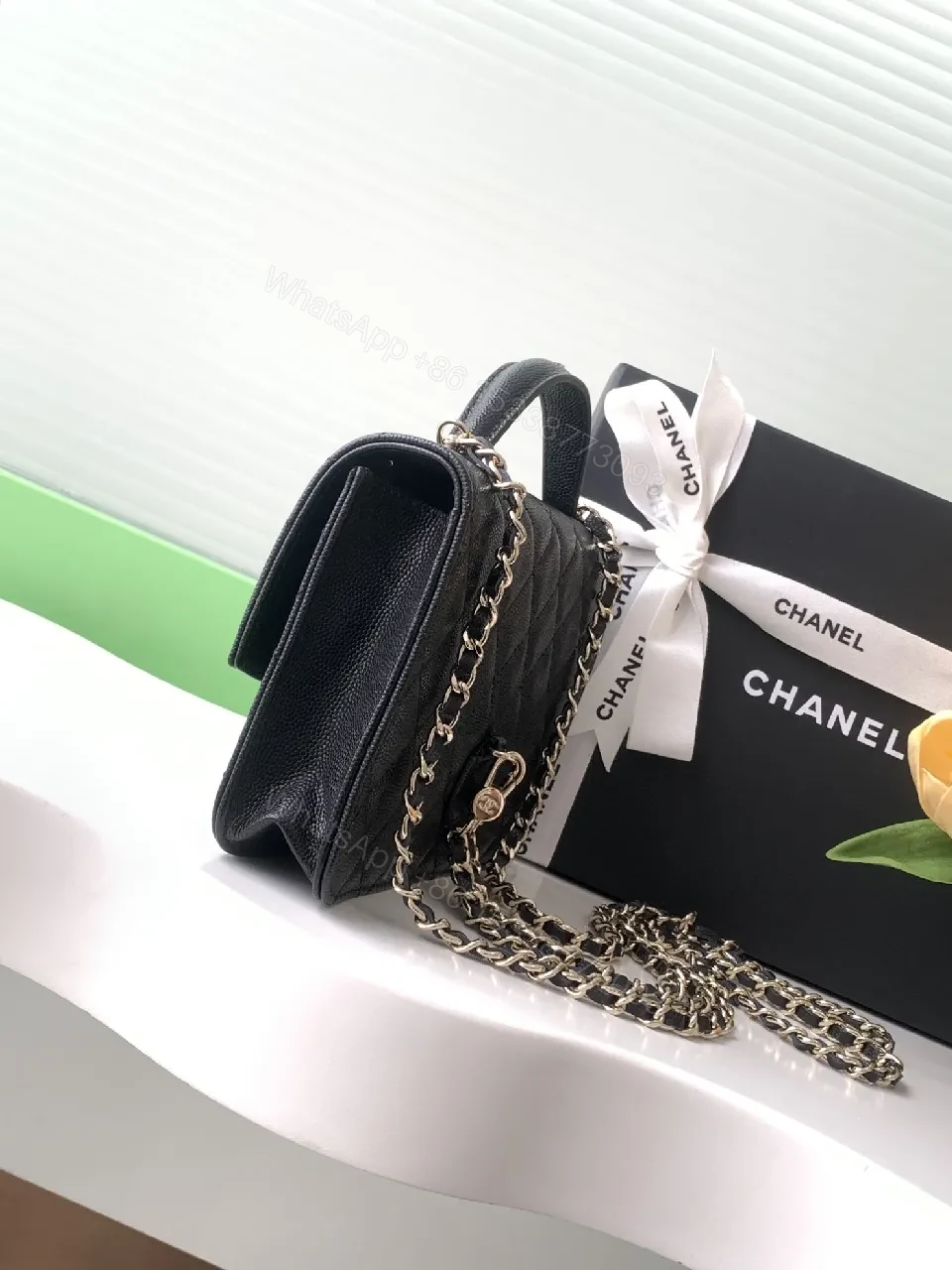 View 4 of Quilted Mini Bag: Gold Chain, Classic Style, Compact Chic