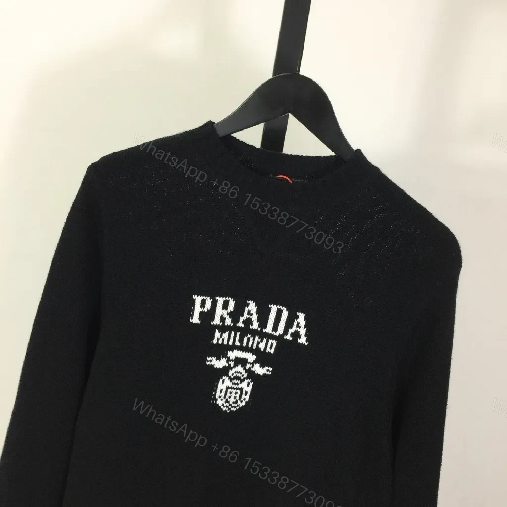 View 7 of Leather-Feel Knit Crewneck with Crest: Subtle Luxury Comfort