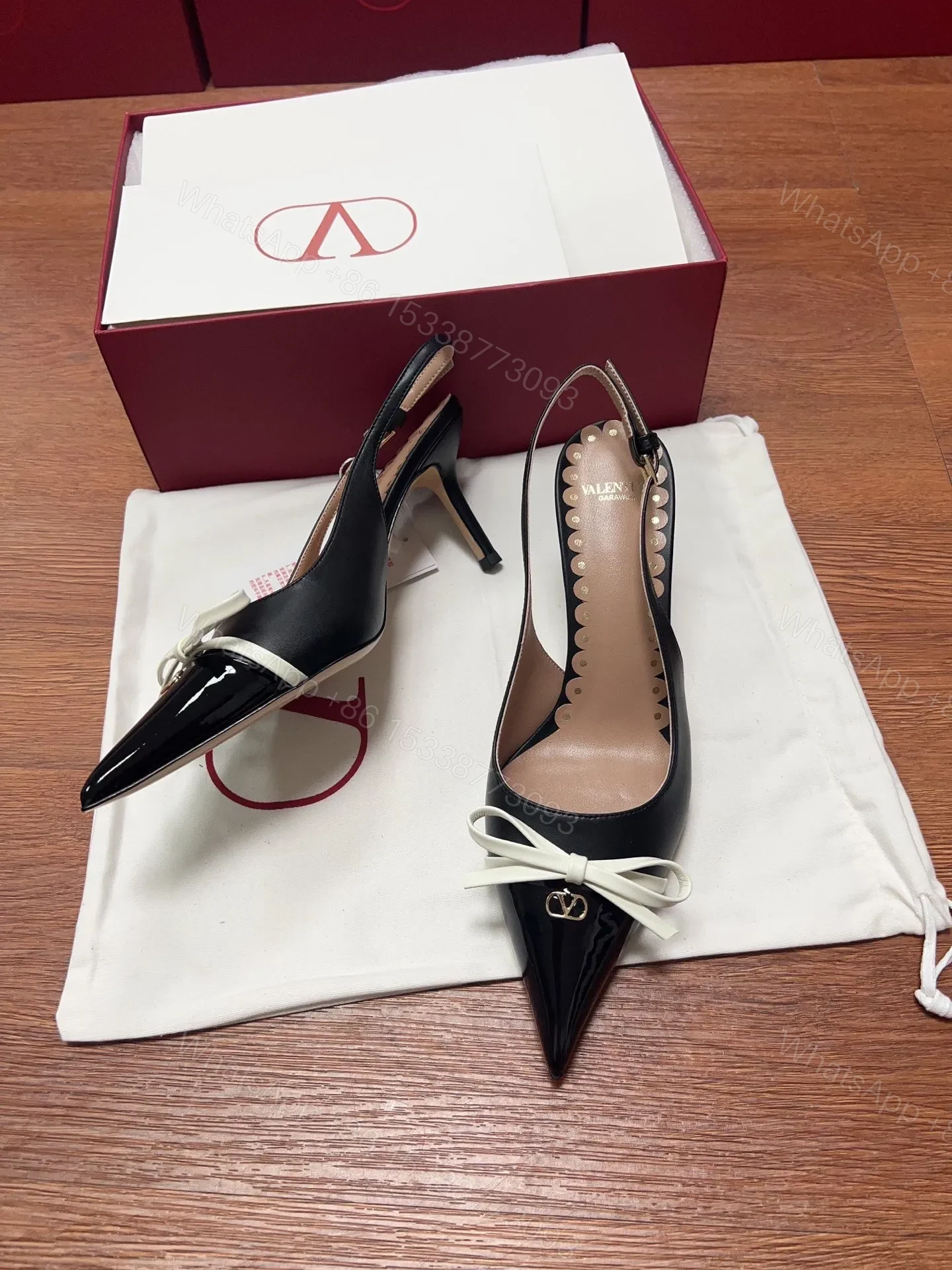 View 6 of Valentino Women Black Patent Leather Bow Slingback Pumps