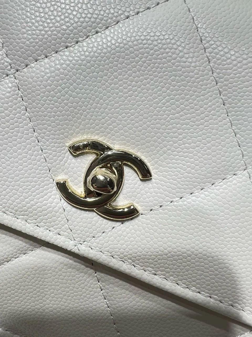 View 6 of White Quilted Mini Bag: Gold Logo, Structured Luxury, Compact
