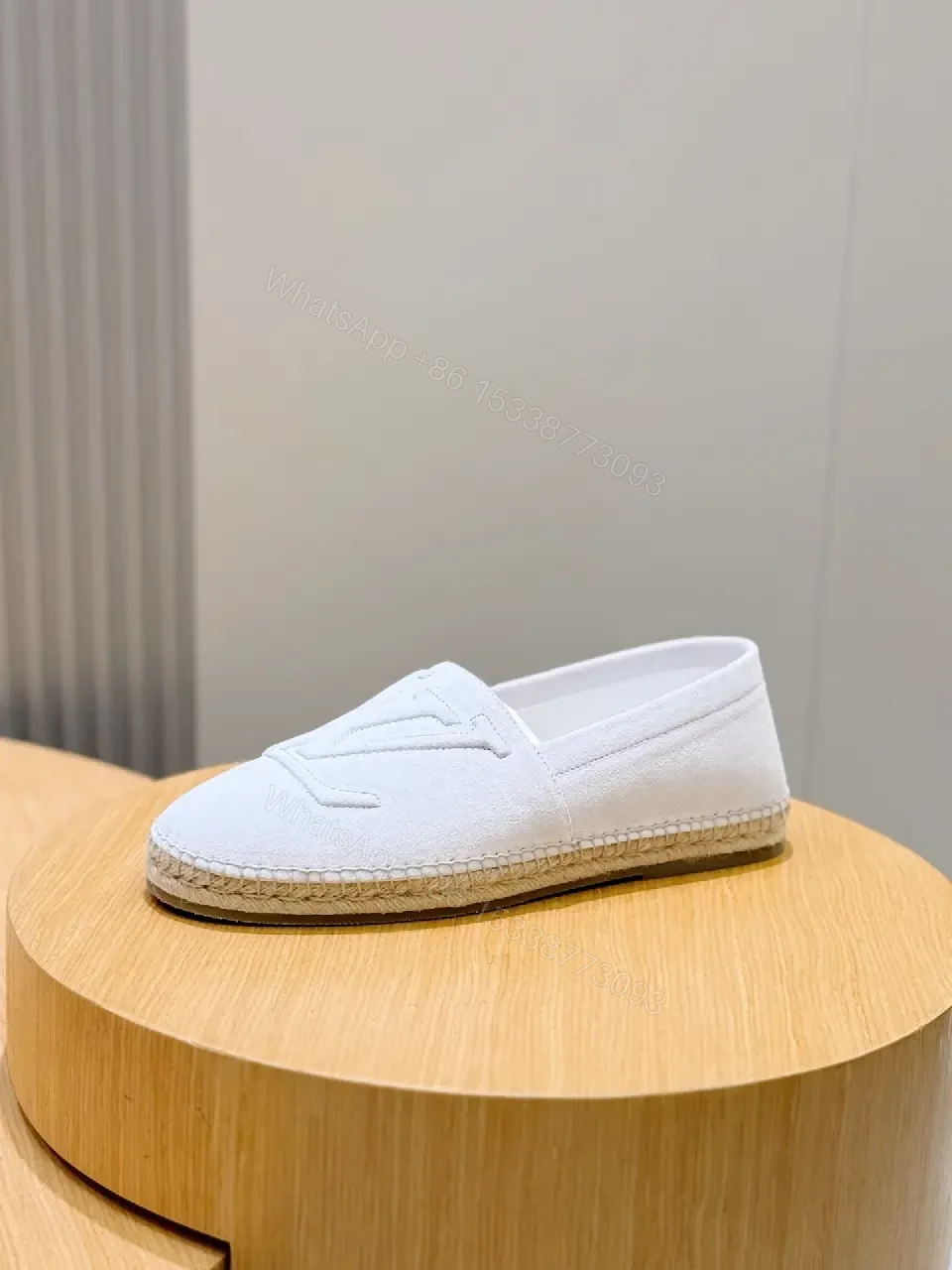 View 3 of Minimalist White Slip-Ons with Subtle LV Motif Fusion Shoes
