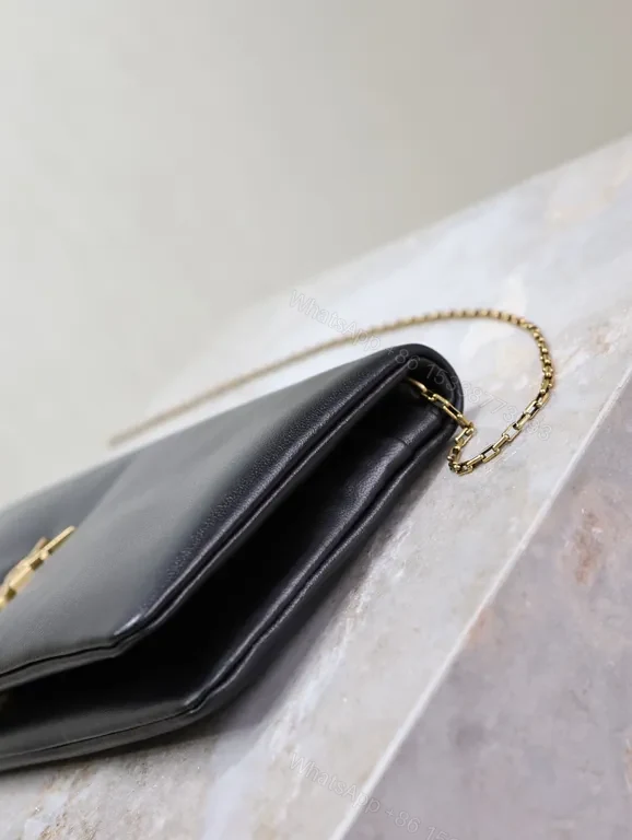 View 7 of Elegant Black Leather Clutch with YSL Gold Emblem - Night-Ready, All-Day Confidence