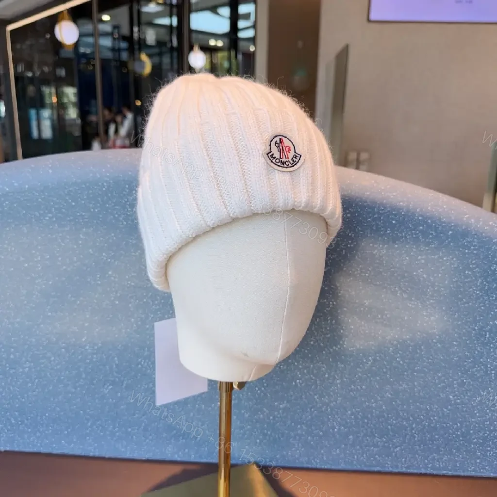View 2 of Cozy Knit Beanie: Soft Ribbed Warmth, Subtle Emblem, Luxury Style