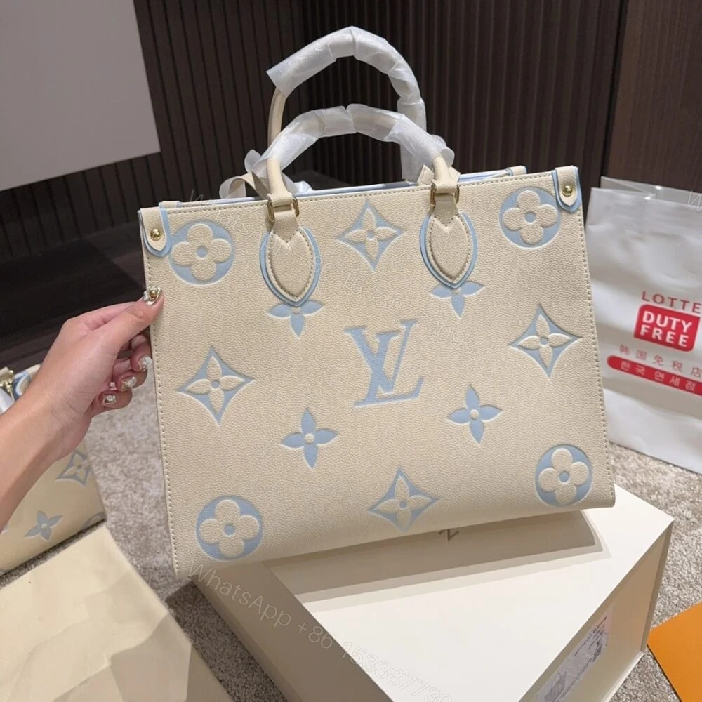 View 2 of Louis Vuitton Onthego PM Candy Blue 25Cm M46833