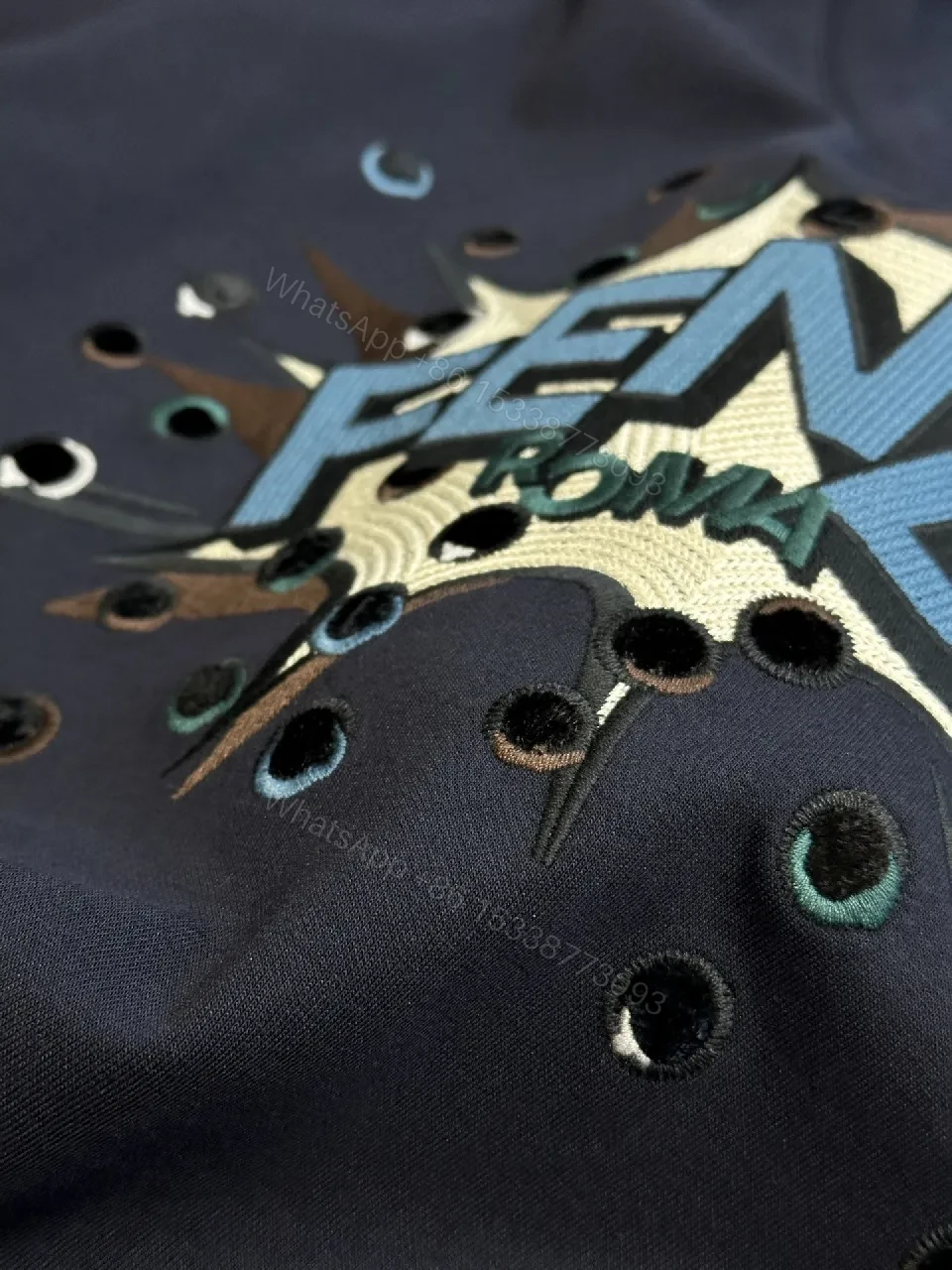 View 8 of Bold Logo Grafitti Tee: Premium Cotton, Cutouts, Navy