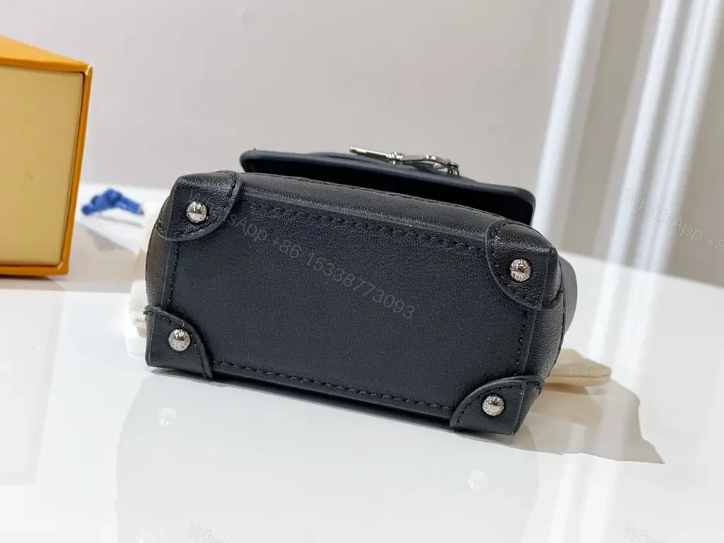 View 6 of Monogram Mini Bag: Compact Luxury Crossbody Bag with Chain