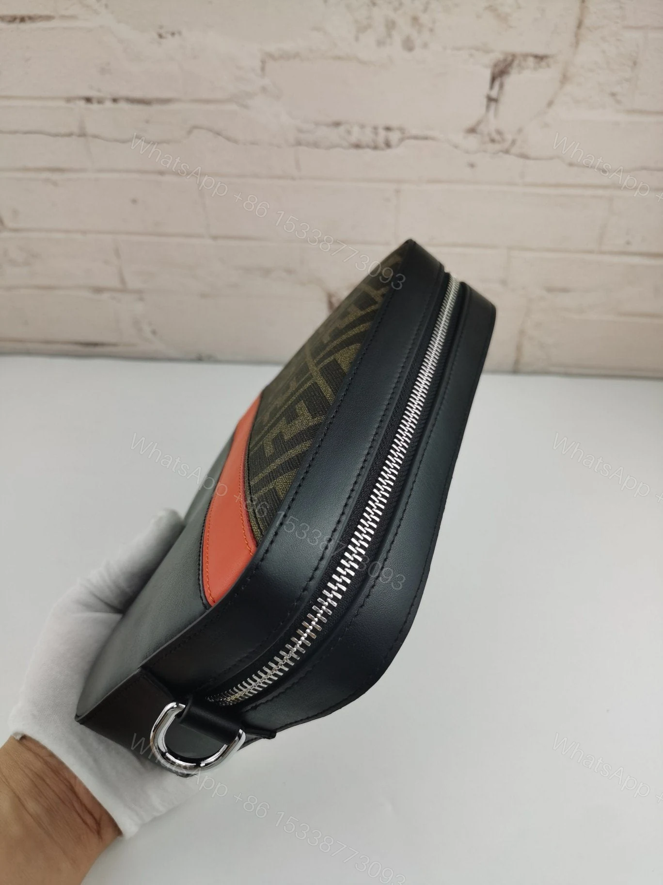 View 3 of Fendi Perforated Logo Shoulder Bag