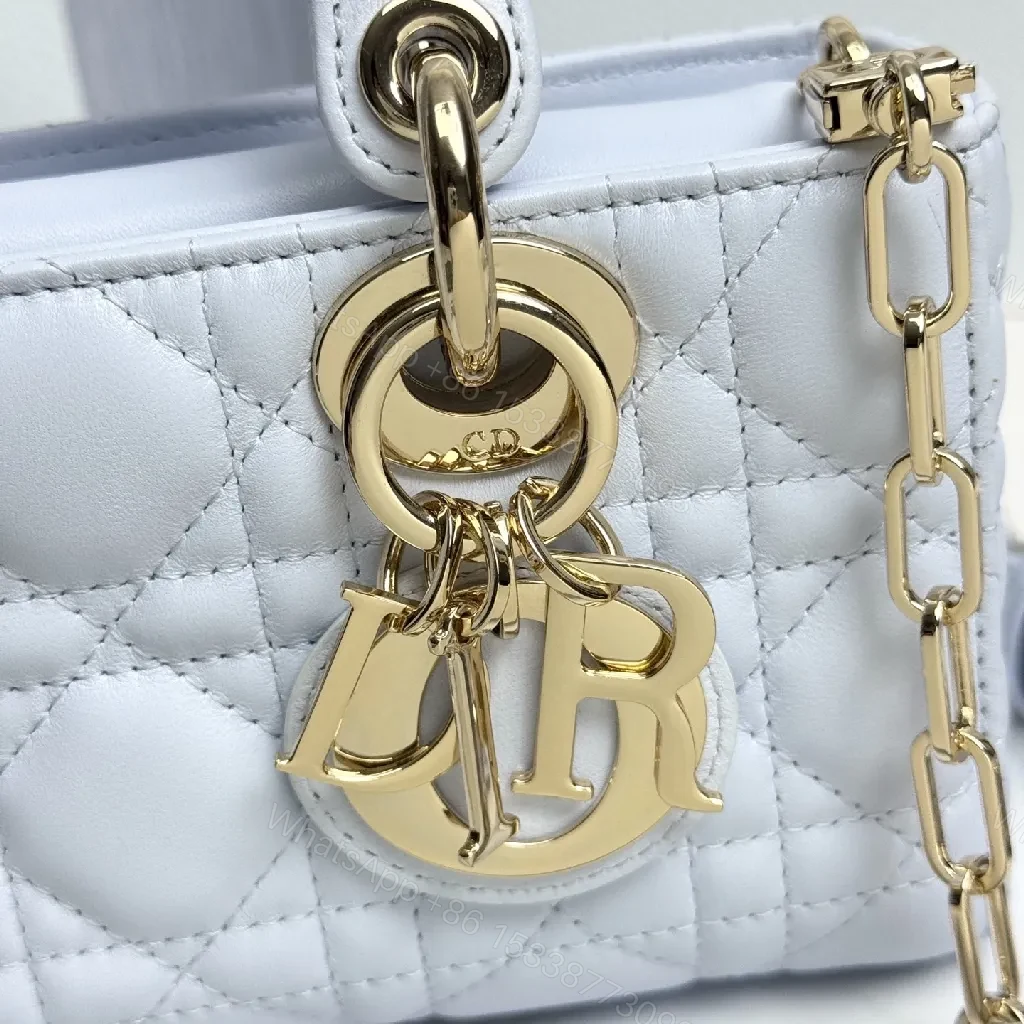 View 5 of Quilted Mini Bag with Gold Hardware: Chic Everyday Luxury