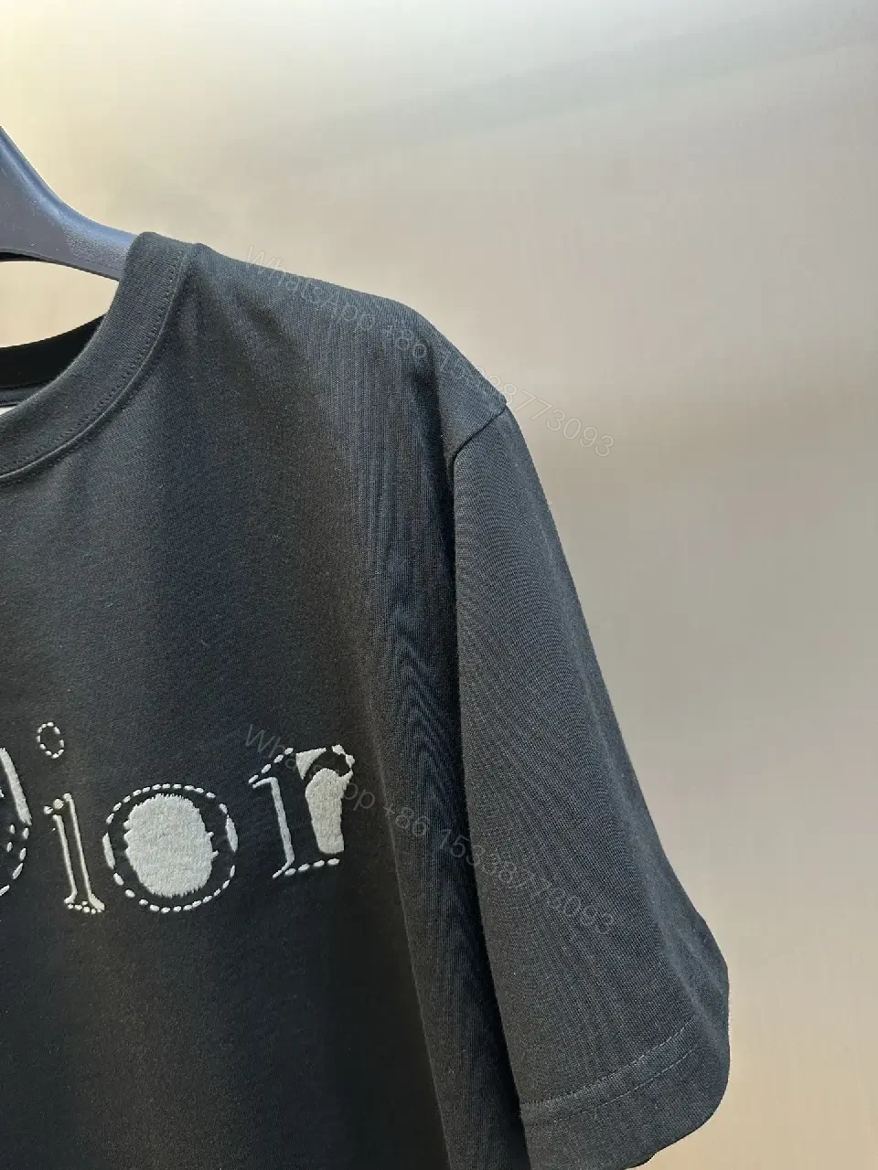 View 11 of Minimalist Black Cotton Tee: Subtle Dior-Inspired Luxury Knit