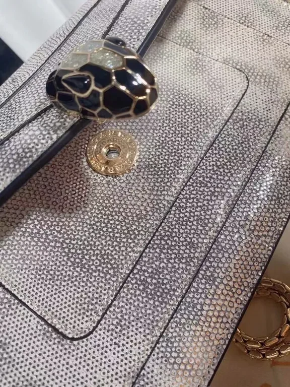 View 9 of Statement Metallic Handbag: BVLGARI x Katrantzou Bracelet Clasp Crossbody