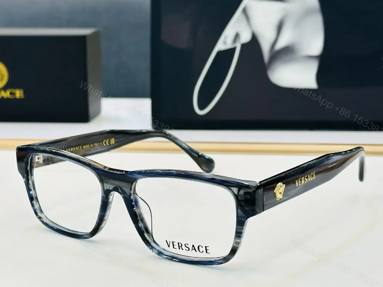 View 7 of Bold Black Acetate Square Glasses with Gold Logo Emblems