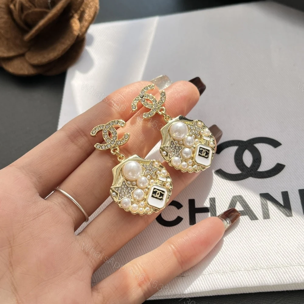 View 2 of CHANEL CLIP ON PENDANT EARRINGS GOLD TONE ABF071 B19292 NADGB