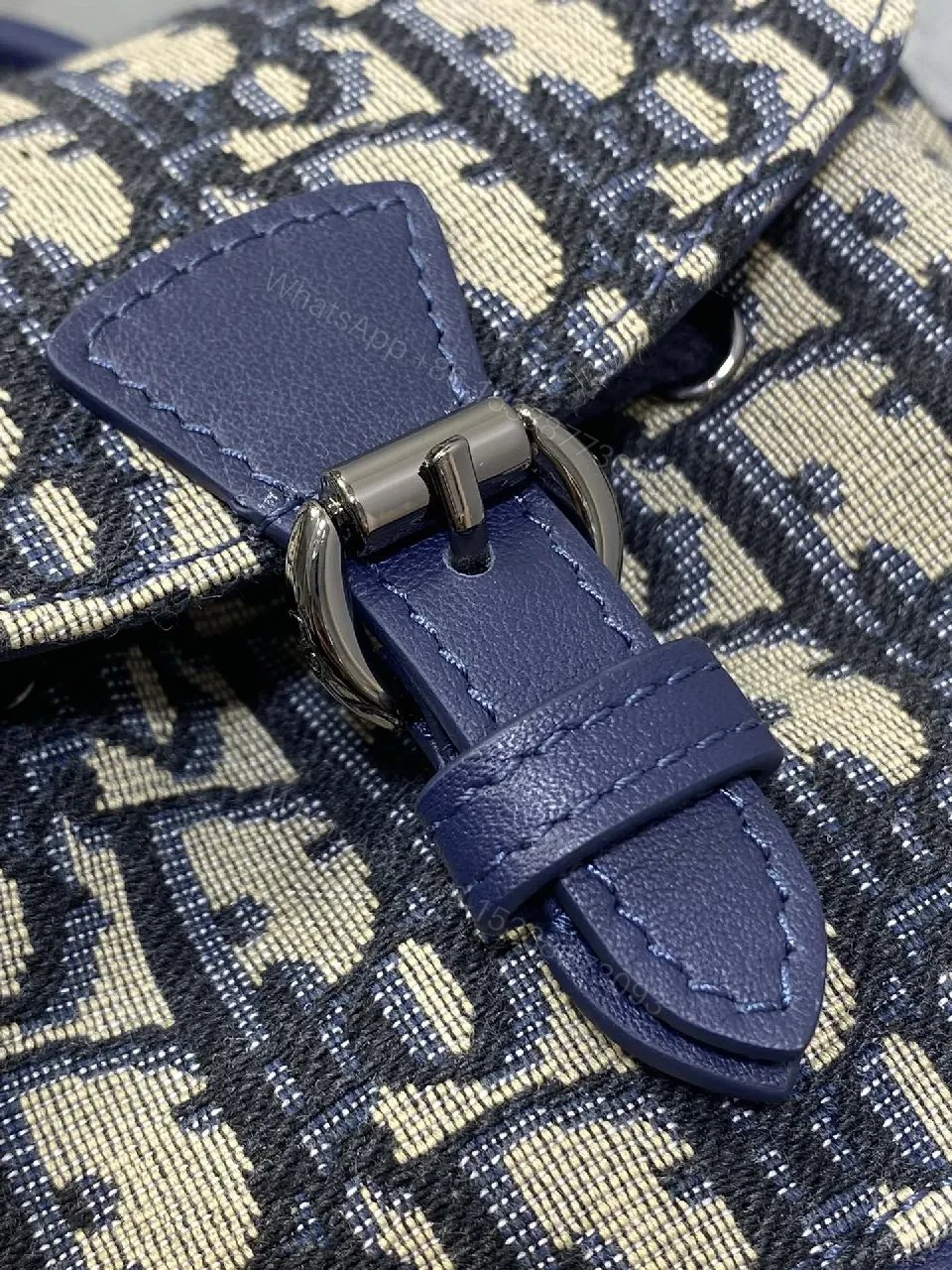 View 4 of Navy Canvas Monogram Compact Backpack with Leather Accents