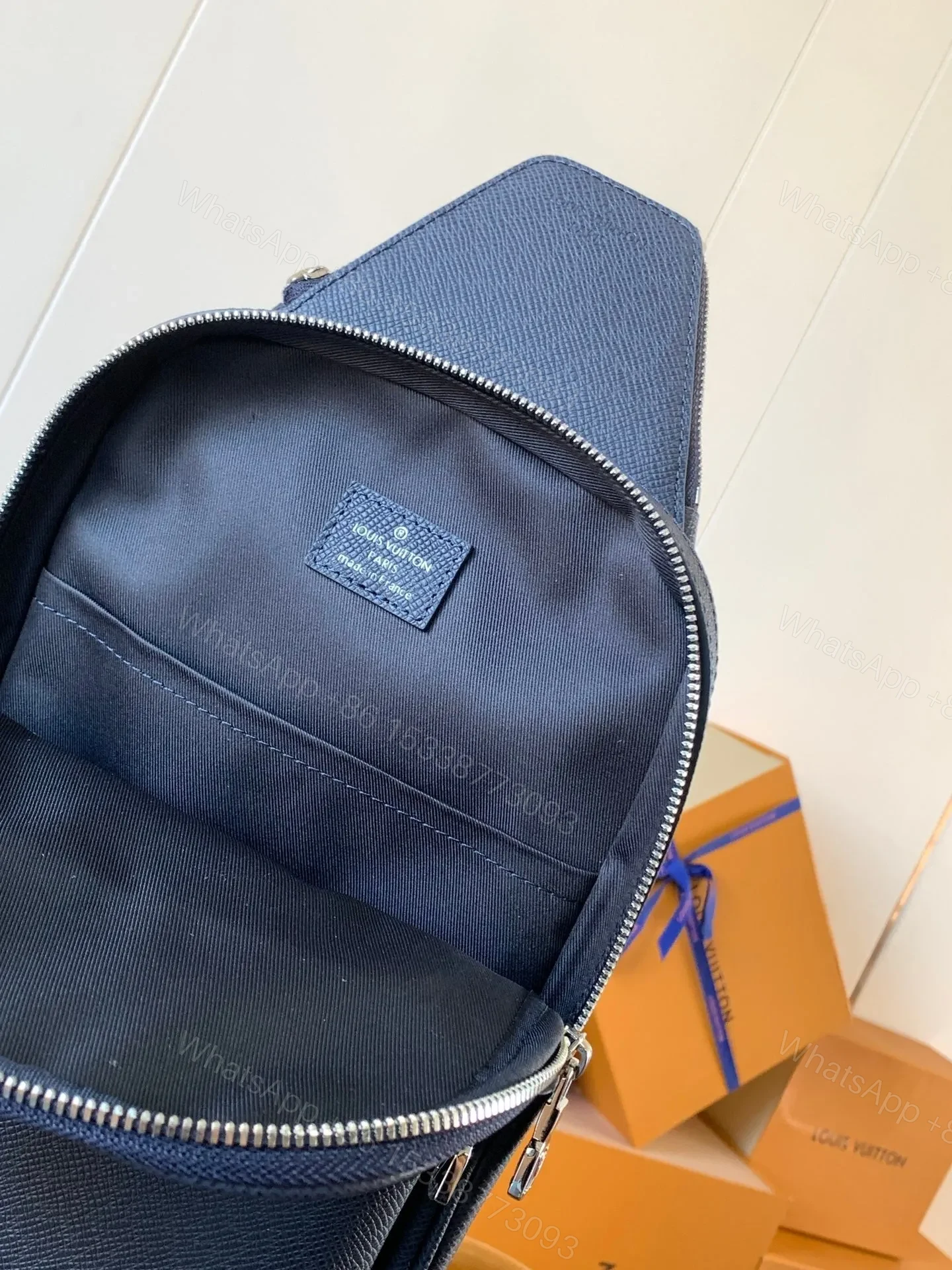 View 4 of LV AVENUE SLINGBAG 31 IN NAVY BLUE TAIGA LEATHER