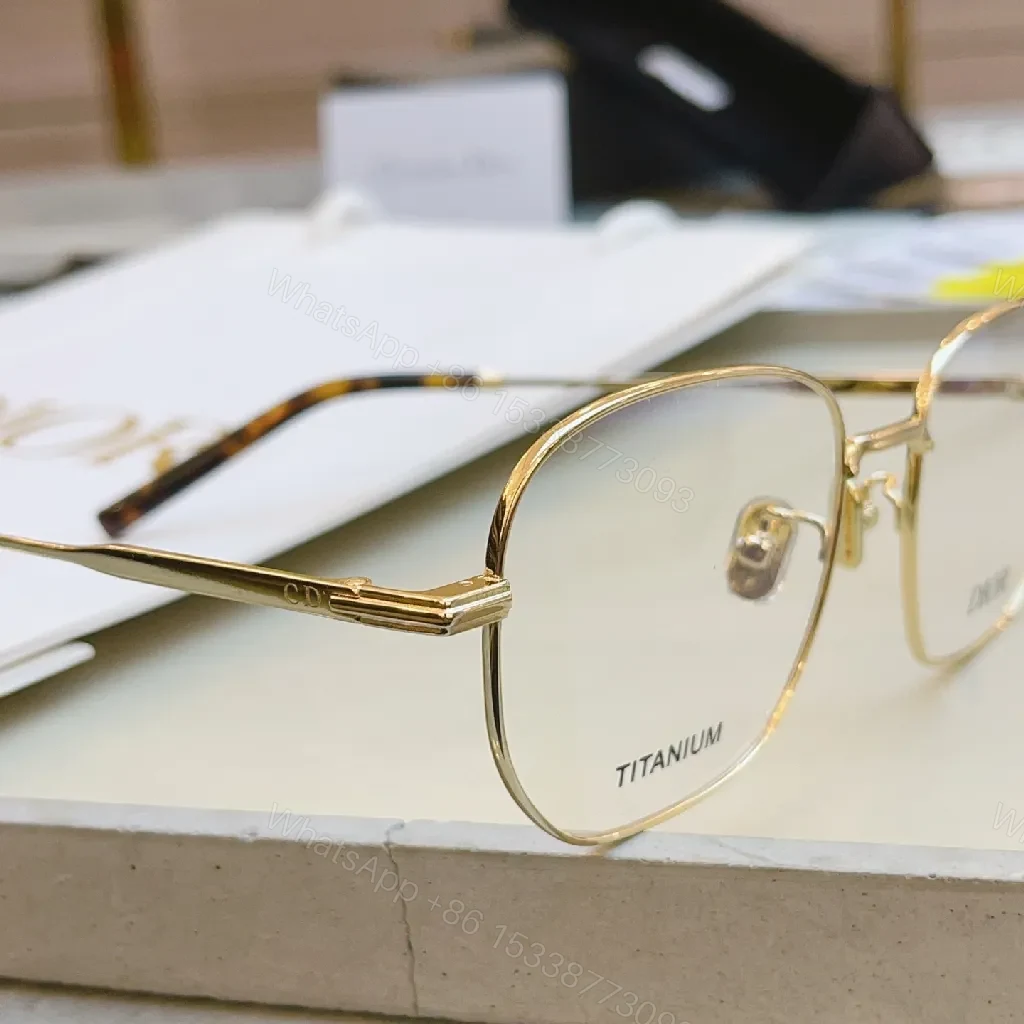 View 9 of Elegant Titanium Rim Eyewear: Subtle Designer Accents Suiting Any Look