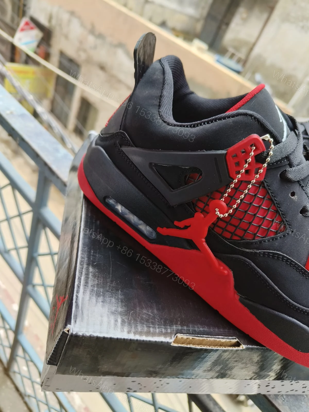 View 5 of BUY FIRST COPY NIKE JORDAN 4 “RED/BLACK” SNEAKERS