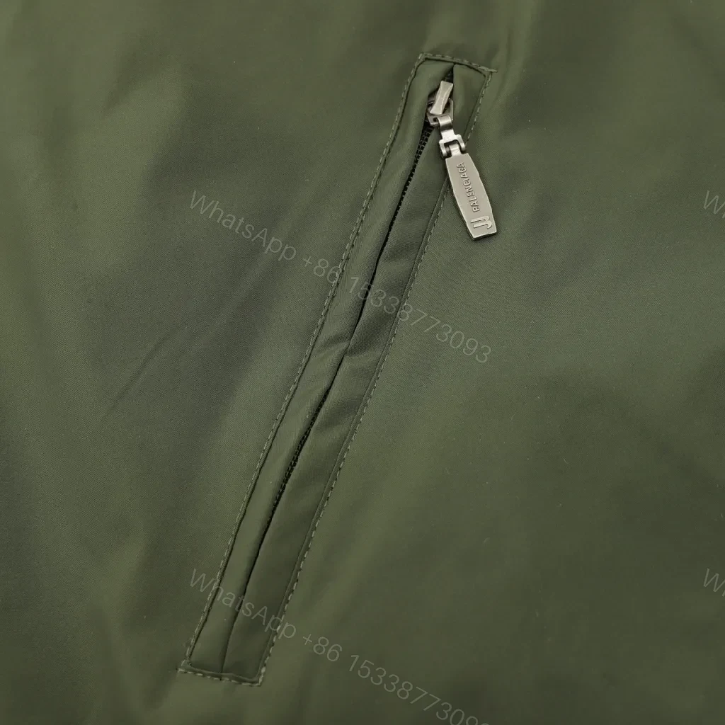 View 3 of Olive Pave Coach Jacket: Subtle Stride, Bold Presence