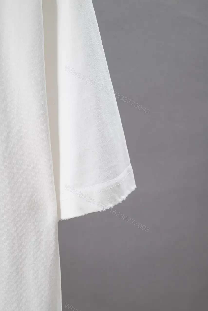 View 8 of White Embroidered Logo Oversized Tee Patch Hemfront Shirt
