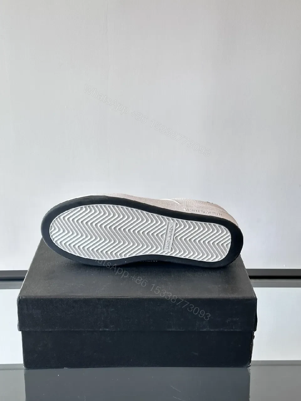 View 9 of White Leather Sneaker with Black Accents — Minimalist Luxury Sneaker