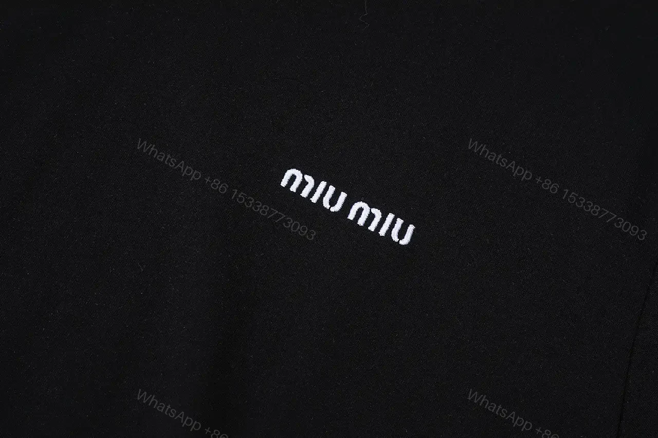 View 4 of Black Cotton Minimalist Tee – Subtle Chest Logo, Premium Essential