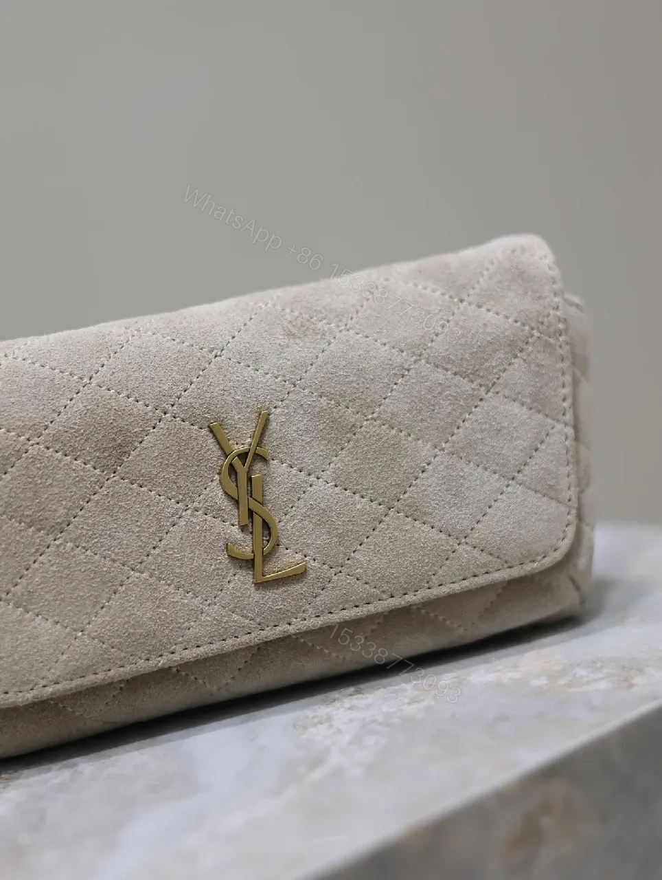 View 8 of Quilted Suede Clutch with Gold Logo Hardware - Classic Chic Clutch