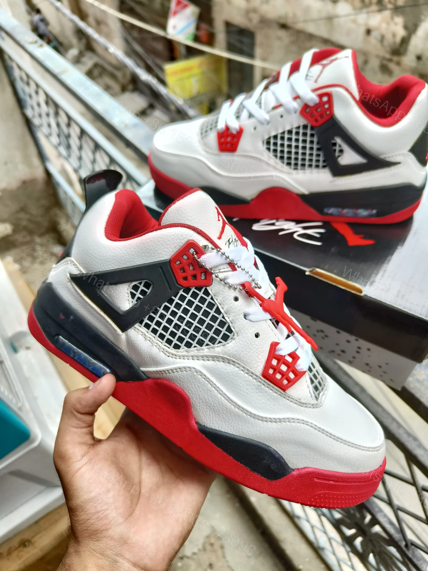 View 11 of BUY FIRST COPY NIKE JORDAN 4 “RED/WHITE” SNEAKERS