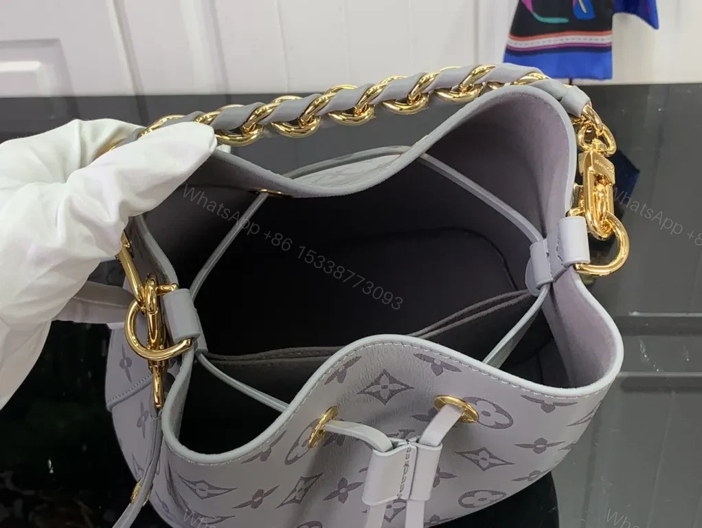 View 6 of Chic Monogram Bucket Bag: Gray Leather, Chain Accent, Versatile Luxury