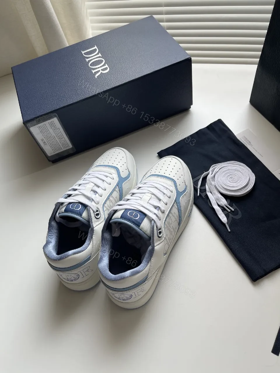 White & Ice Blue Leather Sneakers: Subtle Luxury Trainer — view 1