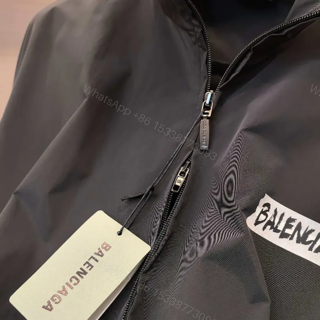 View 9 of Black Satin Windbreaker: Minimalist, Subtle branding, Packable jacket