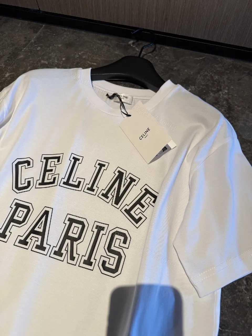 View 4 of White Cotton Modern Tee: Bold Logo, Premium Comfort, Everyday Style