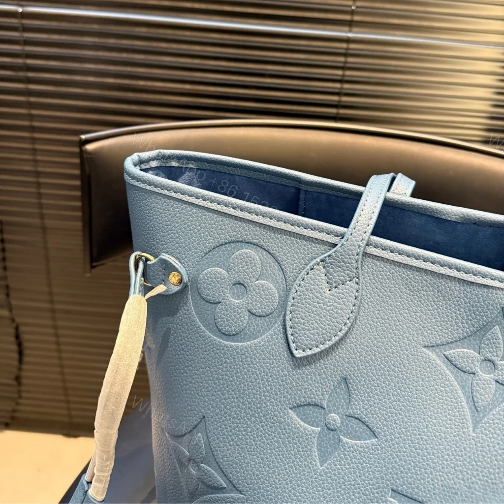 View 4 of Louis Vuitton Neverfull MM Tote Bag Monogram Empreinte Bleu Jean 31cm M27358