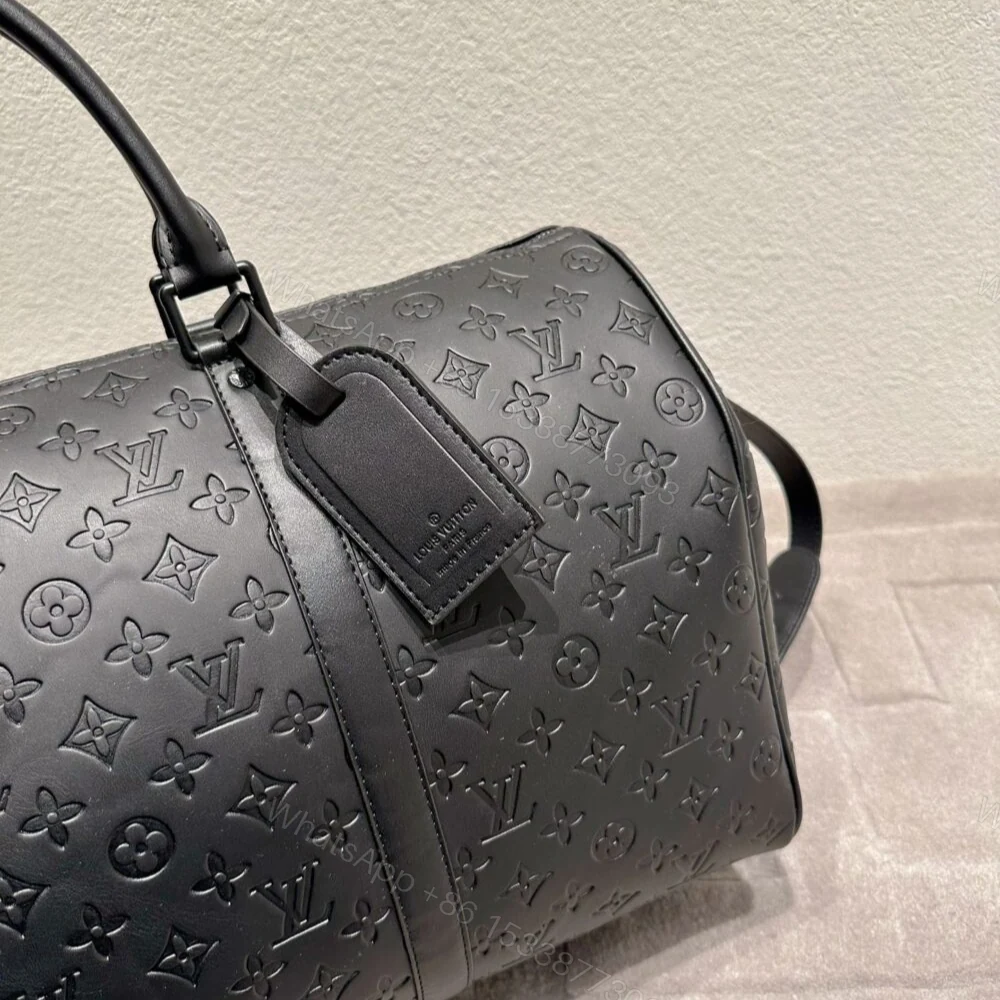 View 3 of Louis Vuitton Keepall Bandoulière 50 Black 50Cm M44810