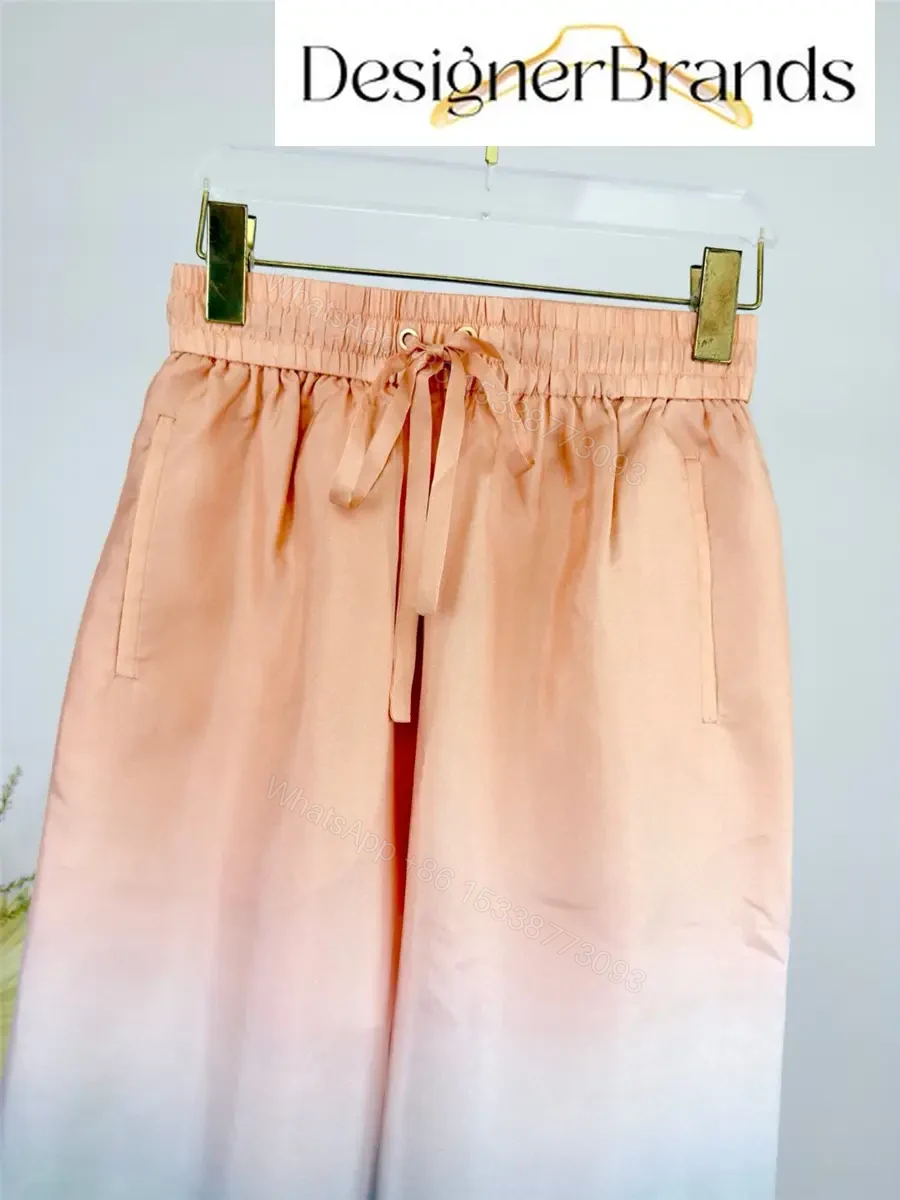 View 4 of Zimmermann Daylight Silk Tie-Dye Wide-Leg Pants