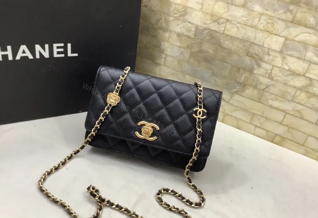 Chic Black Quilted Shoulder Bag with Gold Chain Strap — view 1