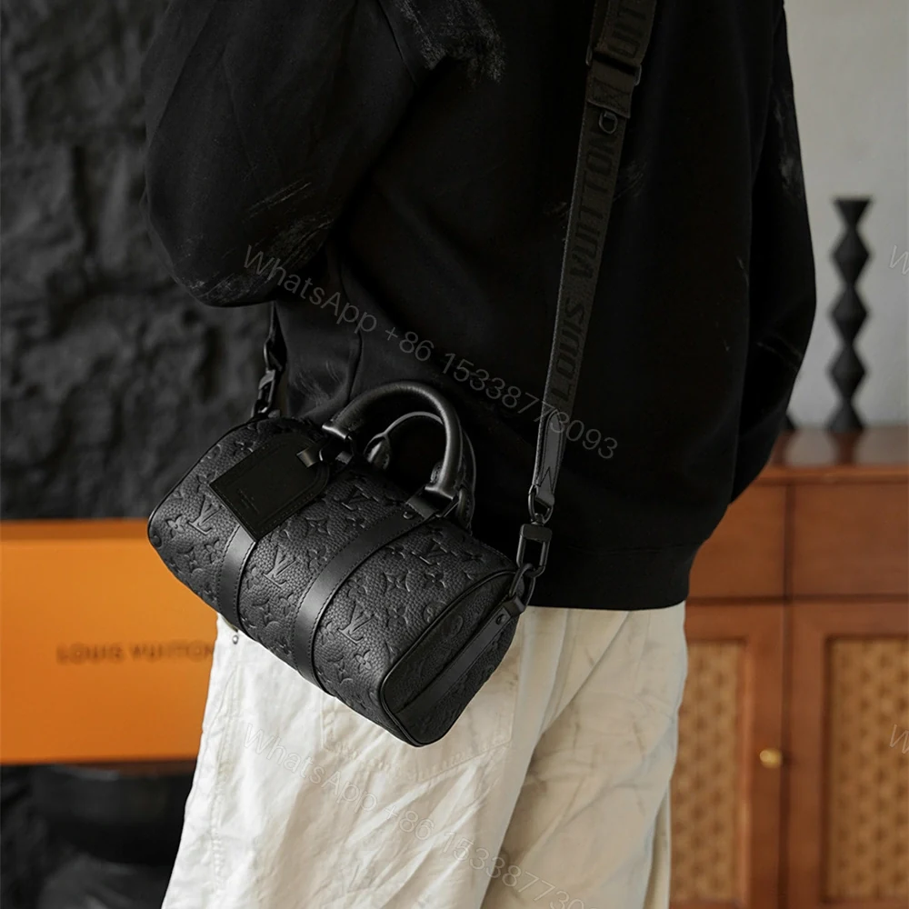 View 22 of 高仿LV*Keepall25系列M20900壓紋牛皮男士單肩包黑色免檢版