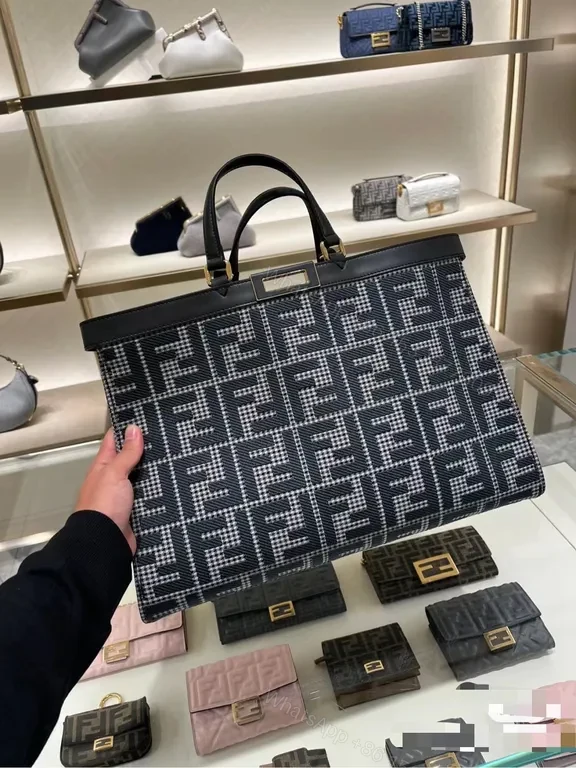 View 3 of Bold Fendi Monogram Structured Handbag: Versatile Luxury