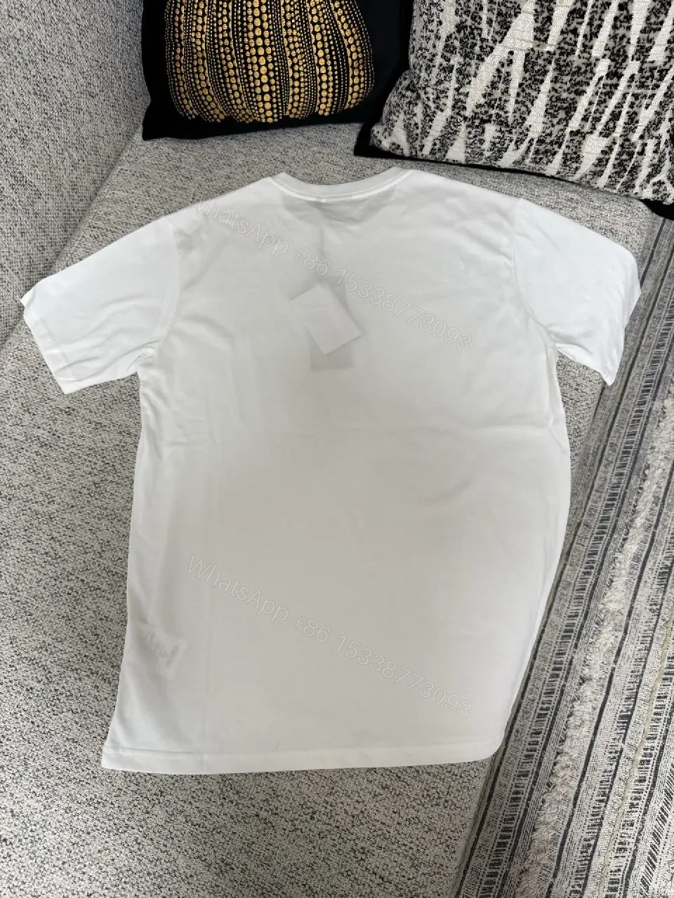 View 7 of Minimalist White Cotton Tee with Subtle Logo