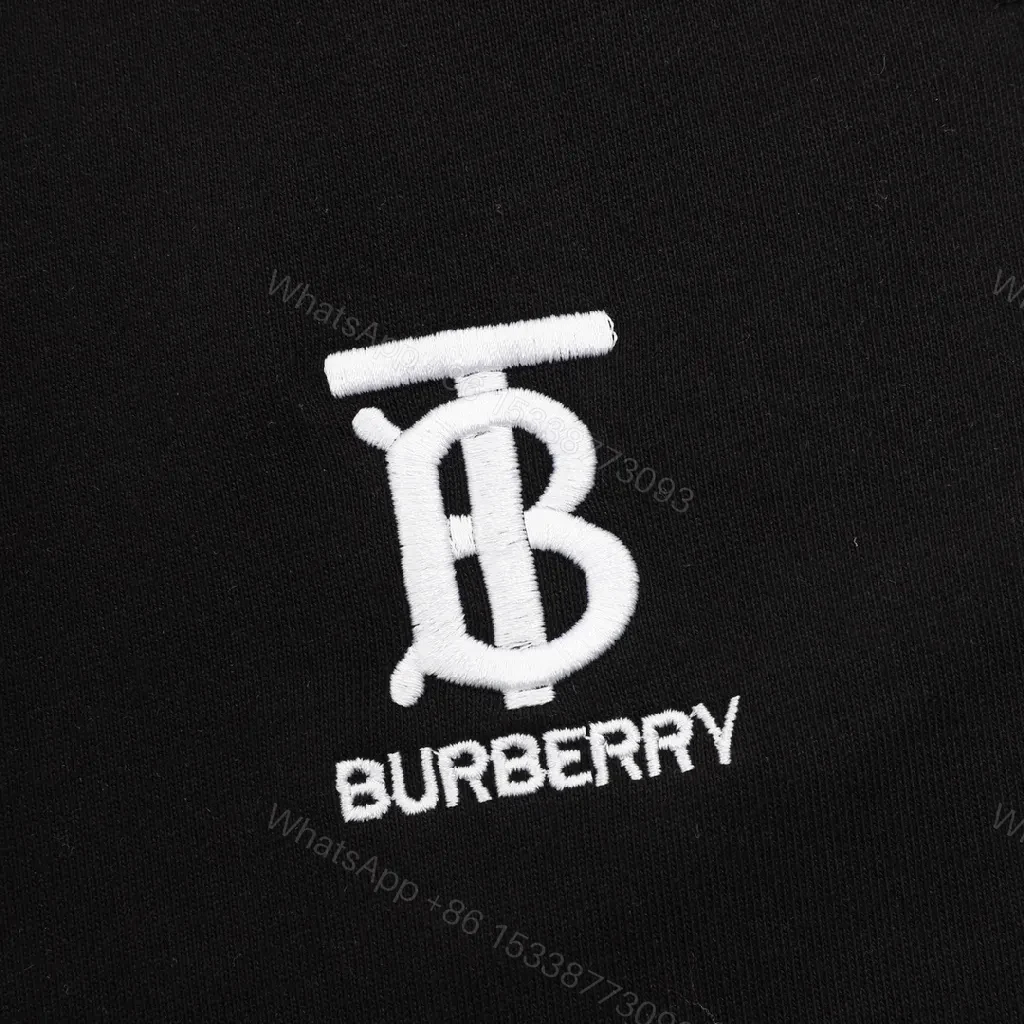 View 10 of Minimalist Black Sweatpants – Premium Comfort, Signature Logo Joggers