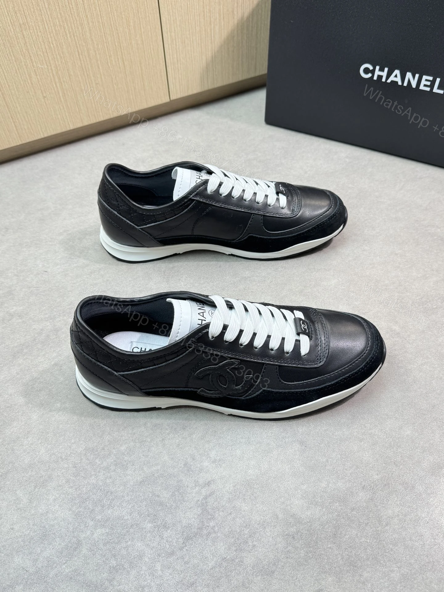 Chanel 黑色A貨運動鞋 經典雙C標誌皮革拼接款 — view 1