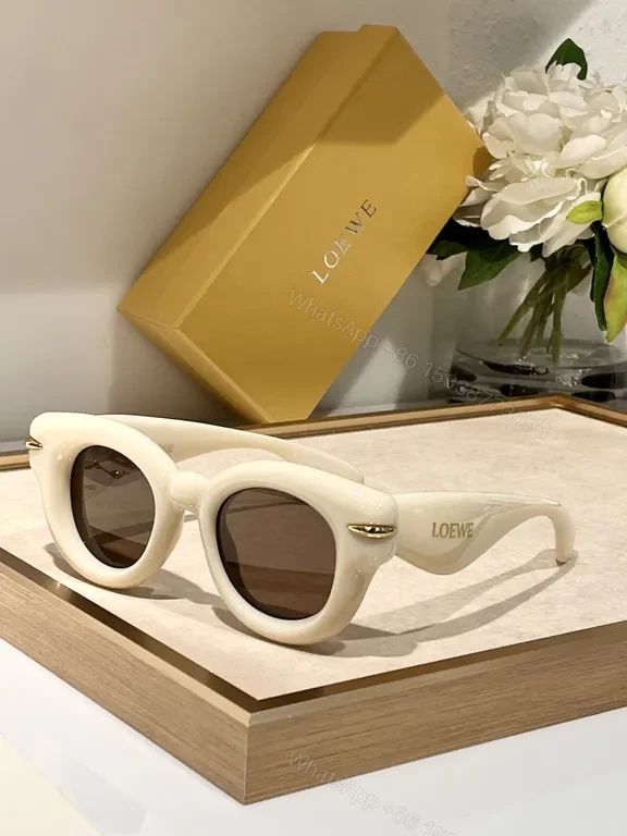 View 7 of Statement Pink Designer Sunglasses: Loewe, UV400, Stylish Comfort
