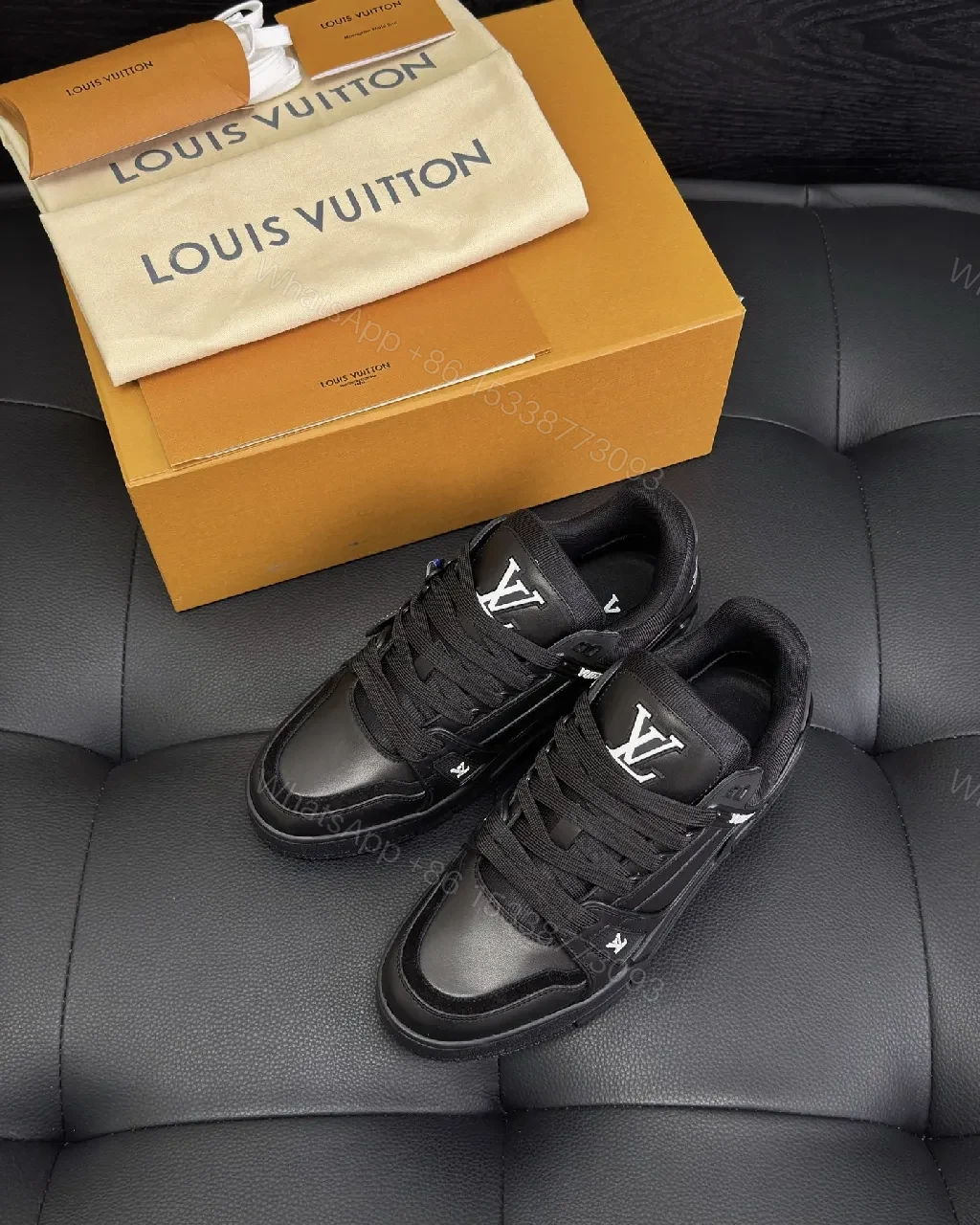 Covert Luxe Leather Trainers: Black Minimalist Comfort Sneakers — view 1