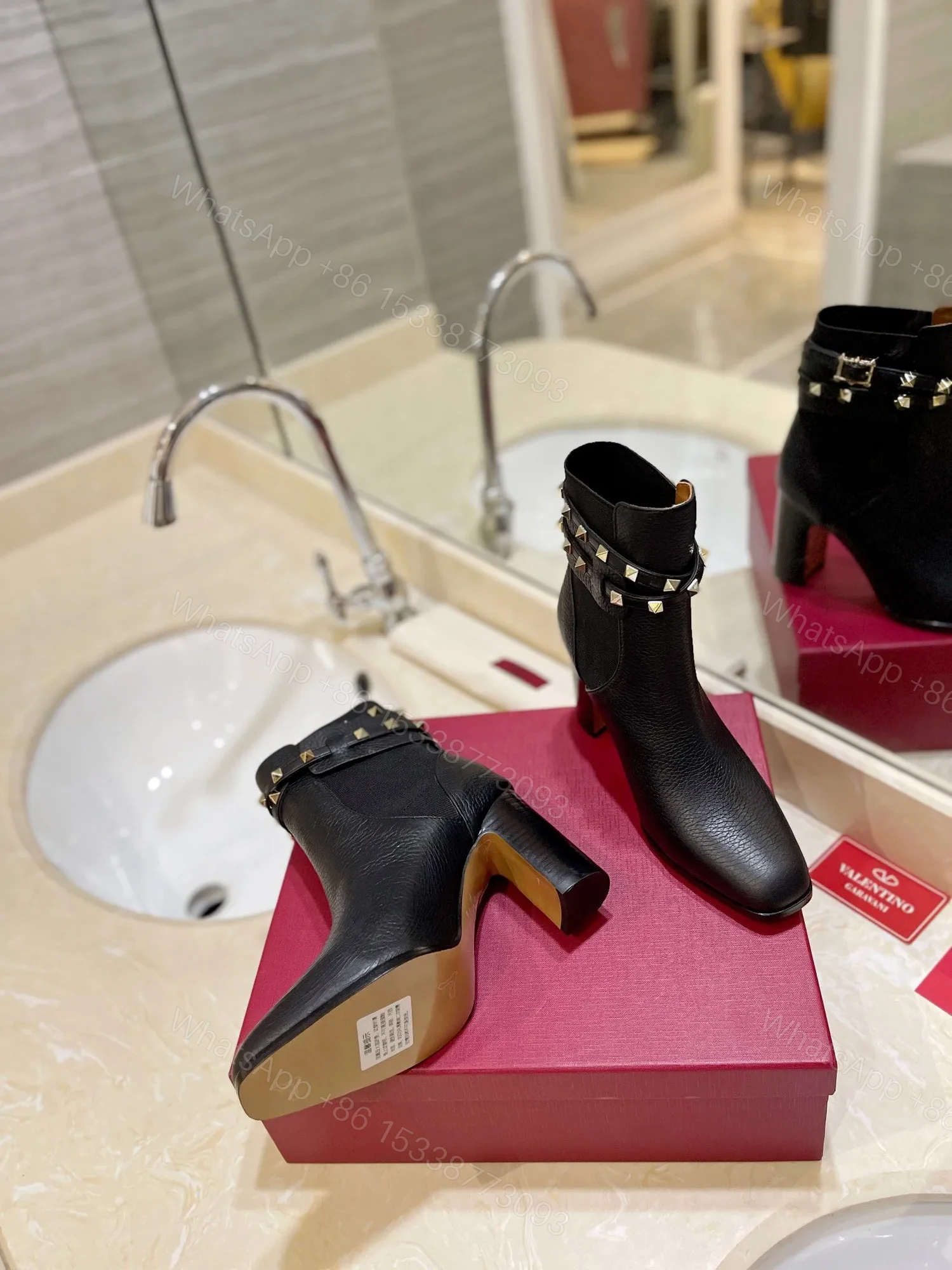 View 2 of Valentino Women Black Leather Studded Ankle Boots