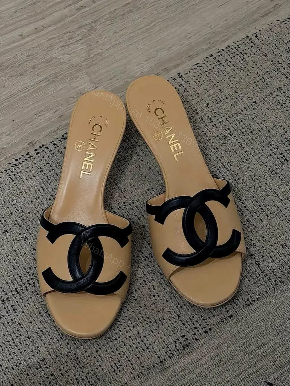 View 3 of Beige Leather Slide Signature Chanel Logo Sandals