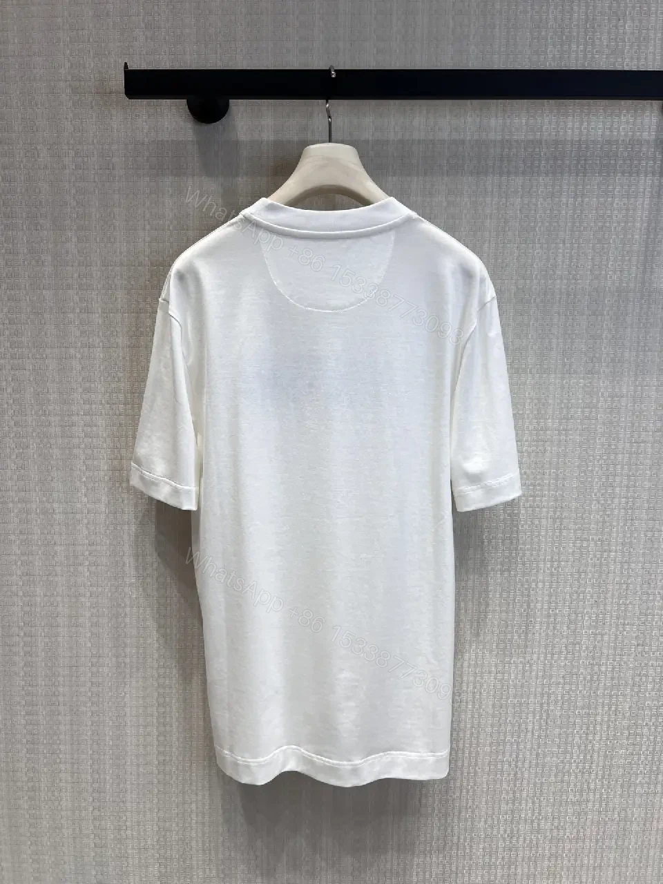 View 5 of Minimalist White Tee with Luxe Embroidered Logo, Casual-Ready Top