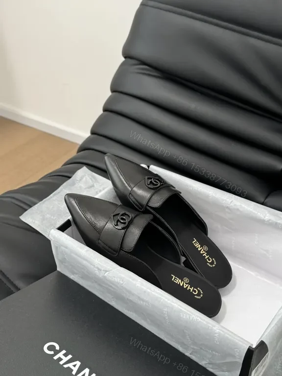 View 6 of Chic Black Leather Mules with CC Detail - Luxury Comfort