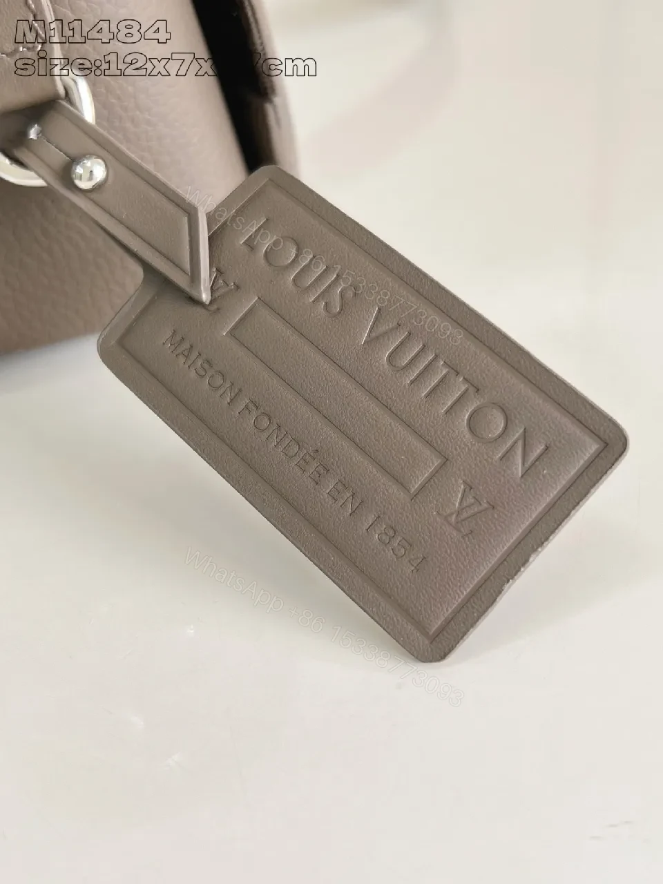 View 2 of Taupe Pebble-Grain Crossbody: Compact Luxury Bag with Subtle Logo