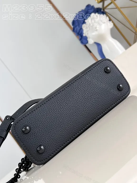 View 4 of Compact Pebble-Leather Crossbody: Monogram-Accent Bag