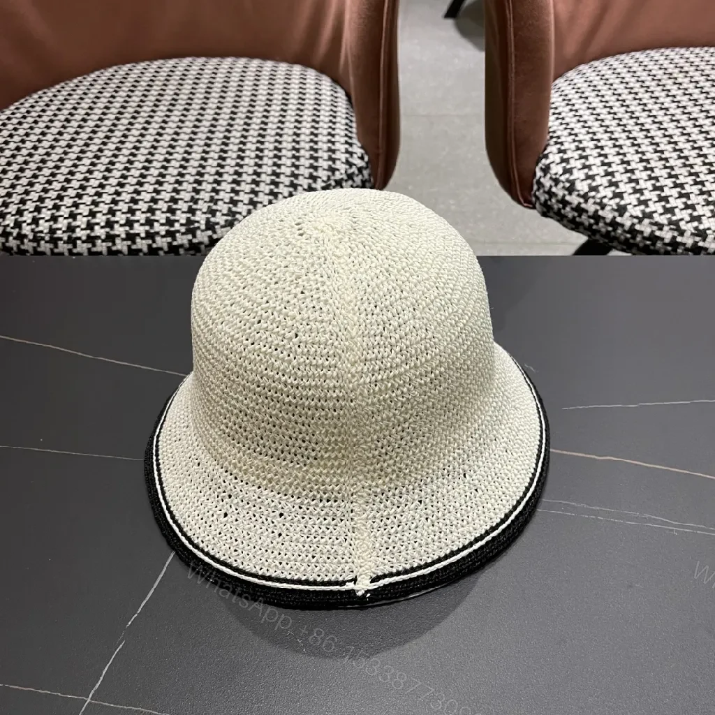 View 2 of Chic Straw Bucket Hat with Subtle Luxury Accent