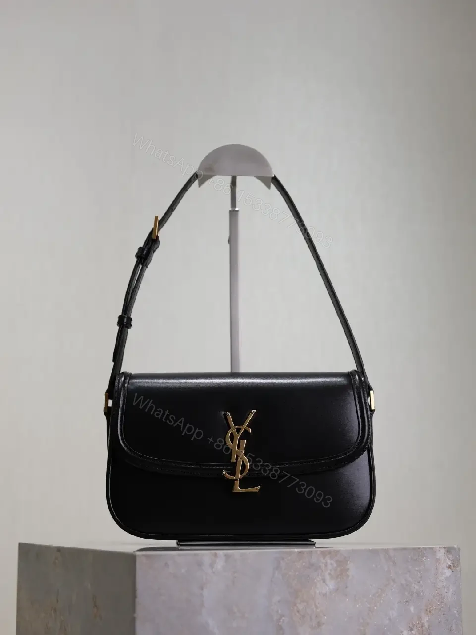 View 7 of Compact Black Leather Shoulder Bag with Gold Hardware