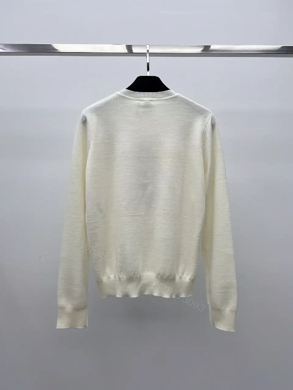 View 4 of cream cotton knit sweater with pink framed monogram print luxury casualwear